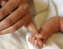 baby and mothers hands